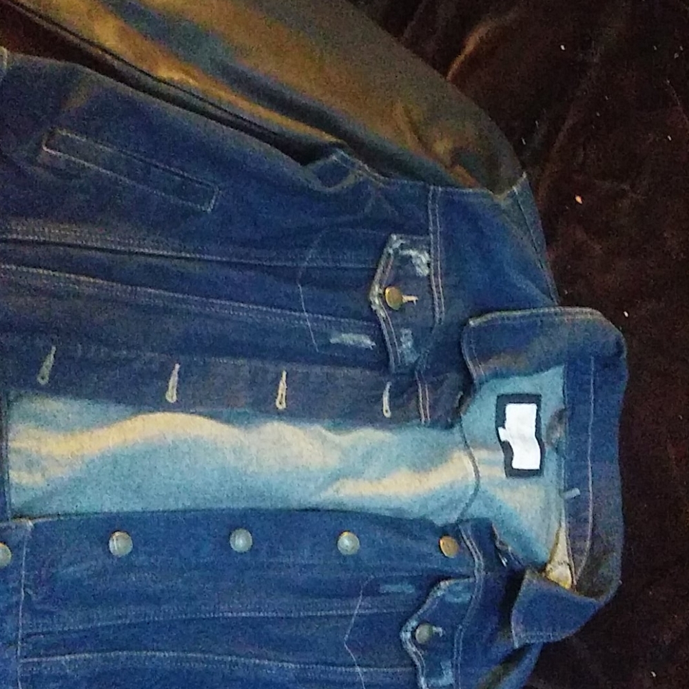 Jean jacket with faux leather sleaves